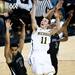 Michigan freshman Nik Stauskas tries to score in the first half of the game against Binghamton on Tuesday. Daniel Brenner I AnnArbor.com